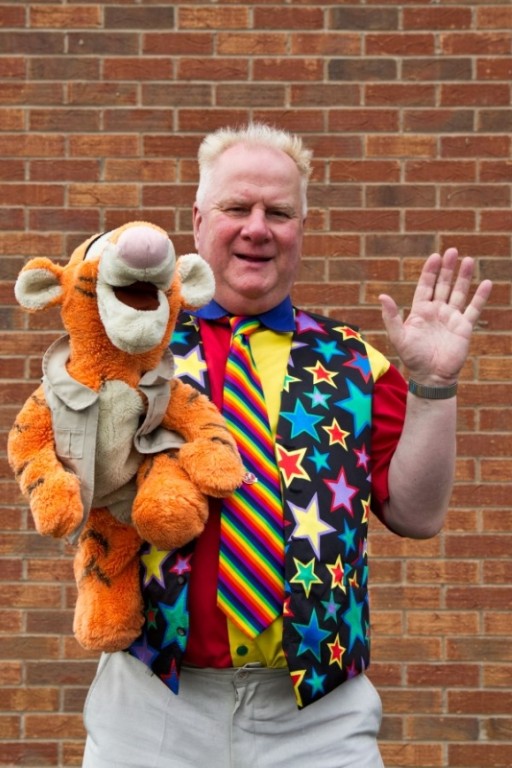 Uncle Chris with animal puppets